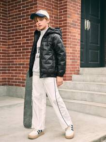 SHEIN Abrigo casual acolchado con capucha con cremallera y textura para niño preadolescente