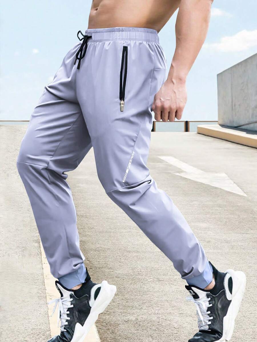 Manfinity Sport Corelite 男友风格男士抽绳拉链口袋慢跑裤 - 淡紫色 - 查看 1