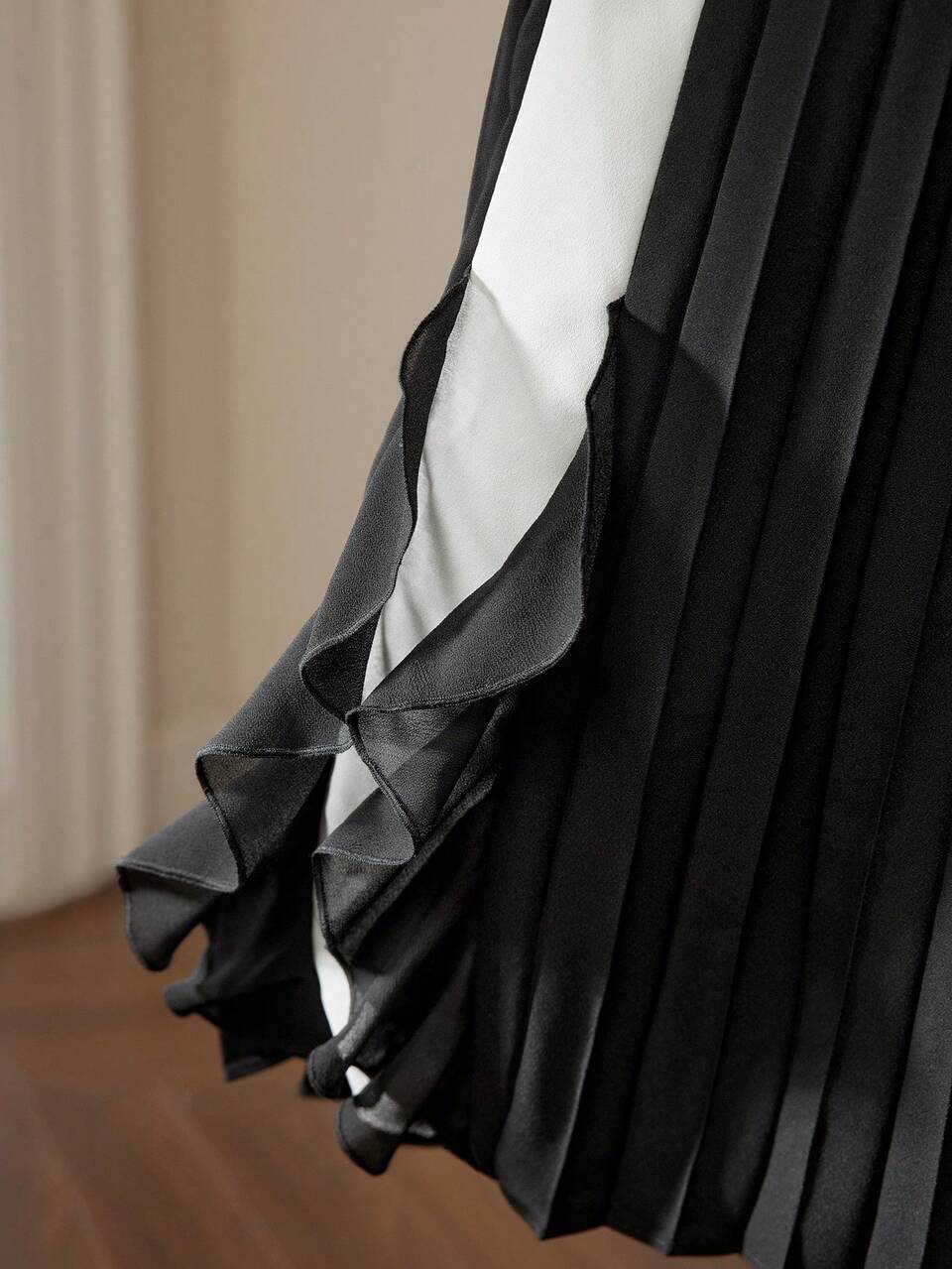 TWO TONE RUFFLE TRIM PLEATED PANEL SKIRT