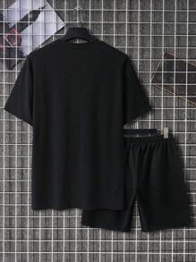 Manfinity Homme Ensemble décontracté avec t-shirt à manches courtes à col rond et short avec imprimé de dessin animé pour homme