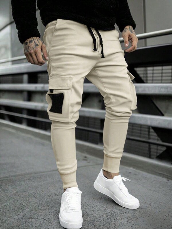 Manfinity EMRG Pantaloni cargo pentru bărbați, care blochează culoarea, cu șnur cu talie, cu buzunare și manșete elastice