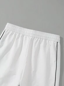 Manfinity Hypemode بنطلون رجالي فضفاض بحزام رباط خصر وخطوط تباين وتفاصيل طباعة حرف