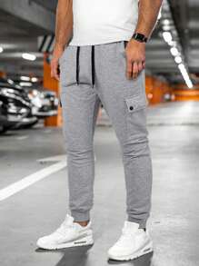 Manfinity Homme Pantalones deportivos casuales para hombre con cordón y bolsillos, unicolor