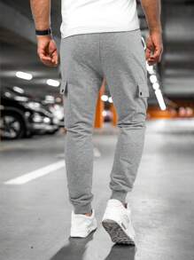 Manfinity Homme Pantalones deportivos casuales para hombre con cordón y bolsillos, unicolor