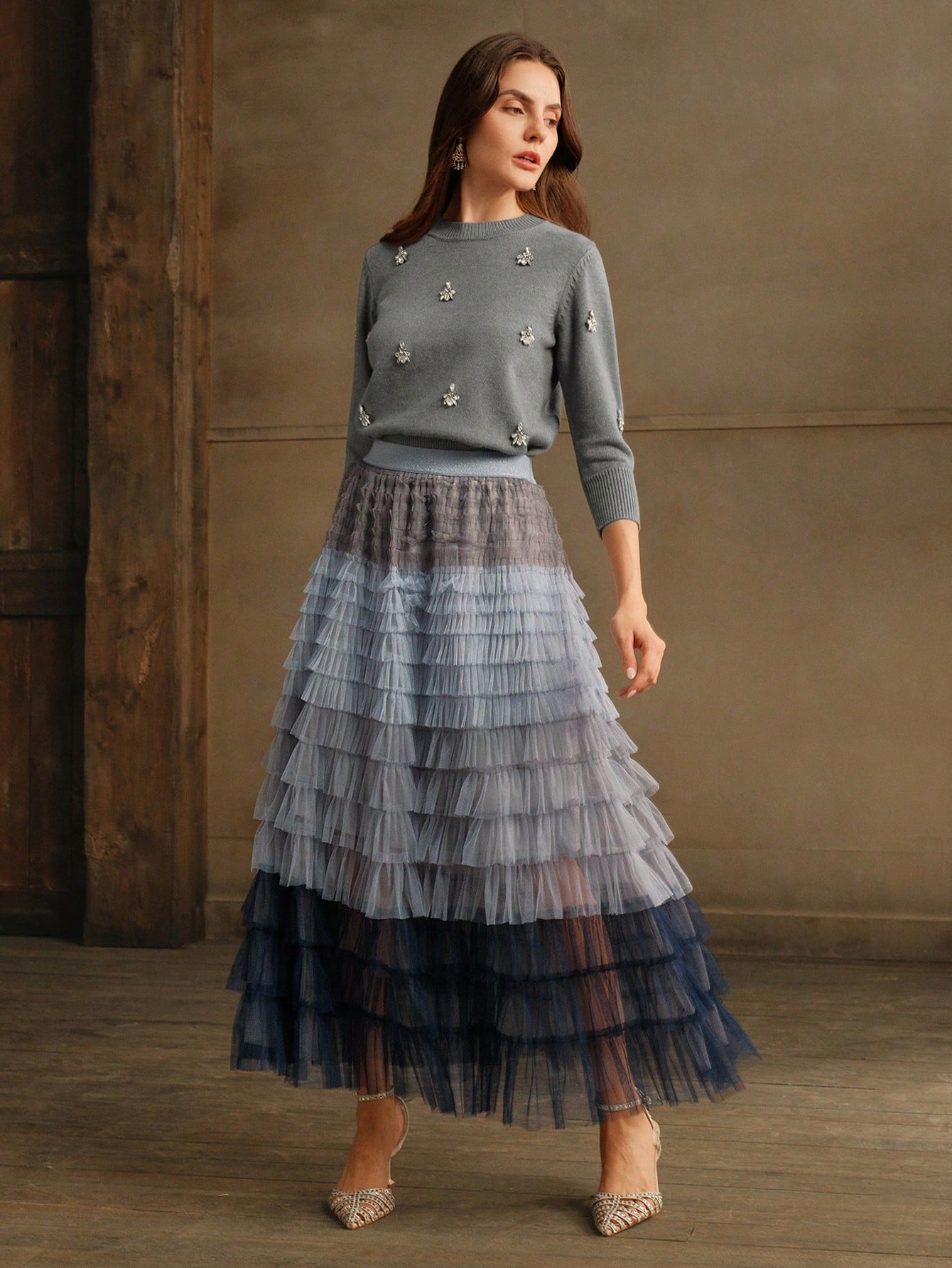 Crystal-embellished sweater with a tulle skirt