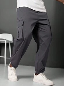Manfinity LEGND Pantalones jogger informales para hombre talla grande con parche con letra y bolsillo cargo
