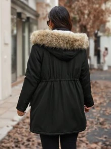 Calvaya Manteau matelassé casual à capuche à cordon de serrage en patchwork avec fausse fourrure pour femmes grandes tailles