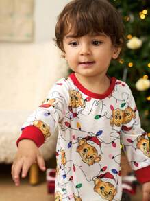 这款男婴连体衣采用狮子印花图案，并饰以圣诞彩灯，充满趣味和节日元素，独特的设计散发着浓浓的圣诞欢乐气氛，是庆祝圣诞节和日常穿着的理想之选。