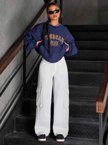 SHEIN ICON Jeans rectos de pierna simplificada con múltiples bolsillos y botón delantero en un estilo lavado sencillo
