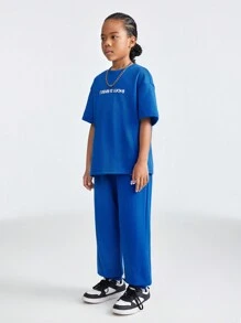 SHEIN Tween Girl Loose Fit Sports Round Neck Short Sleeve T-Shirt And Jogger Pants Set With Letter Print