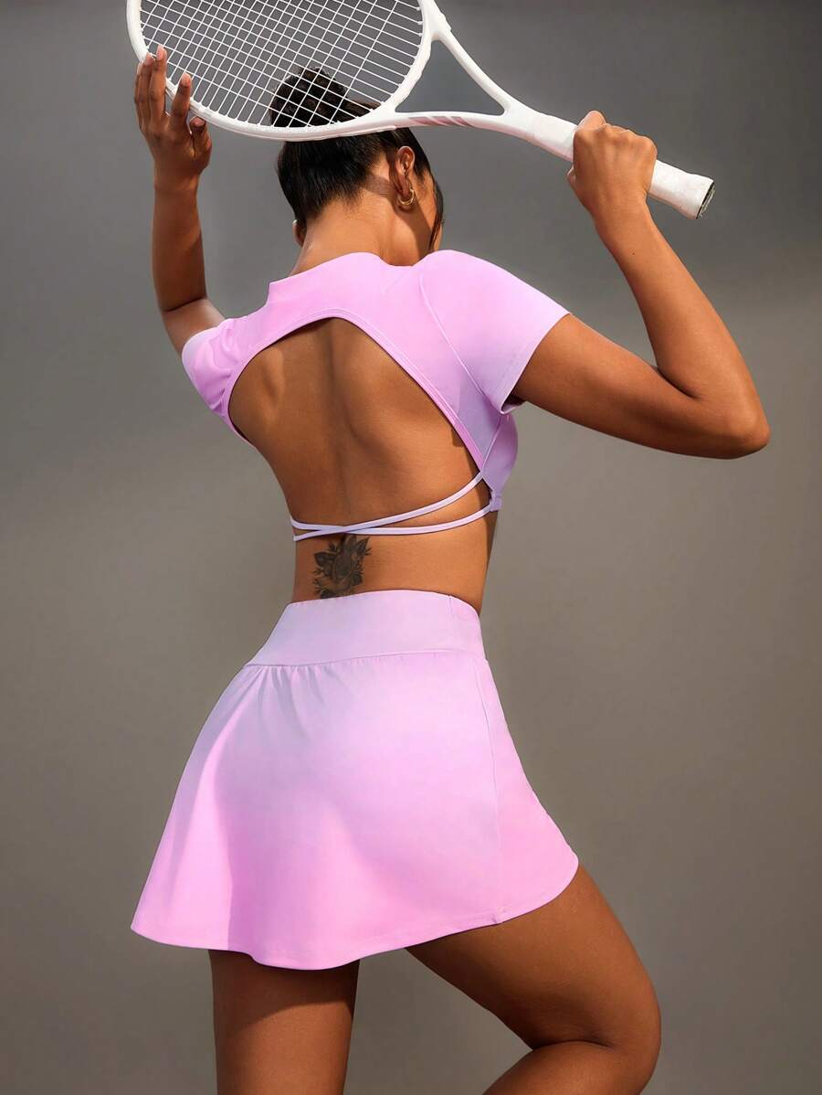 Easithlete Bộ đồ thể thao áo crop top hở lưng thoải mái tối giản và váy có túi đựng điện thoại cho nữ - Hồng - Xem 1