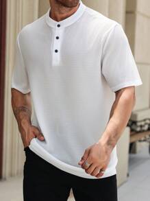 Manfinity Homme Camisa polo casual de manga corta con botones delanteros de unicolor talla grande para hombre