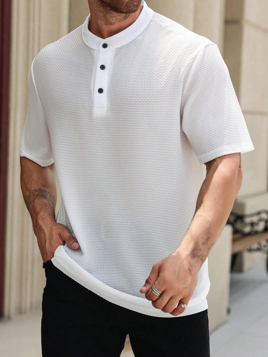 Manfinity Homme Camisa polo casual de manga corta con botones delanteros de unicolor talla grande para hombre