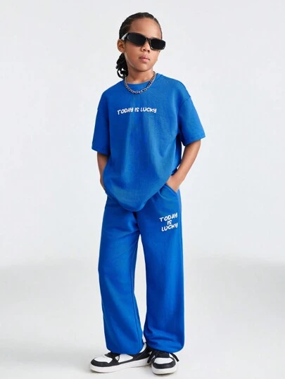 SHEIN 適用於Tween女孩的寬鬆運動圓領短袖T恤和字母印花慢跑褲套裝