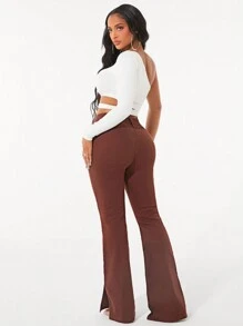 SHEIN SXY Jeans de pierna acampanada con botones, dobladillo dividido, unicolor
