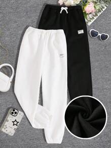 SHEIN Mua 1 tặng 1! Bộ 2 quần nỉ lót nơ thắt eo màu đen trắng cơ bản cho bé gái tuổi teen trở lại trường - Đen và trắng - Xem 1