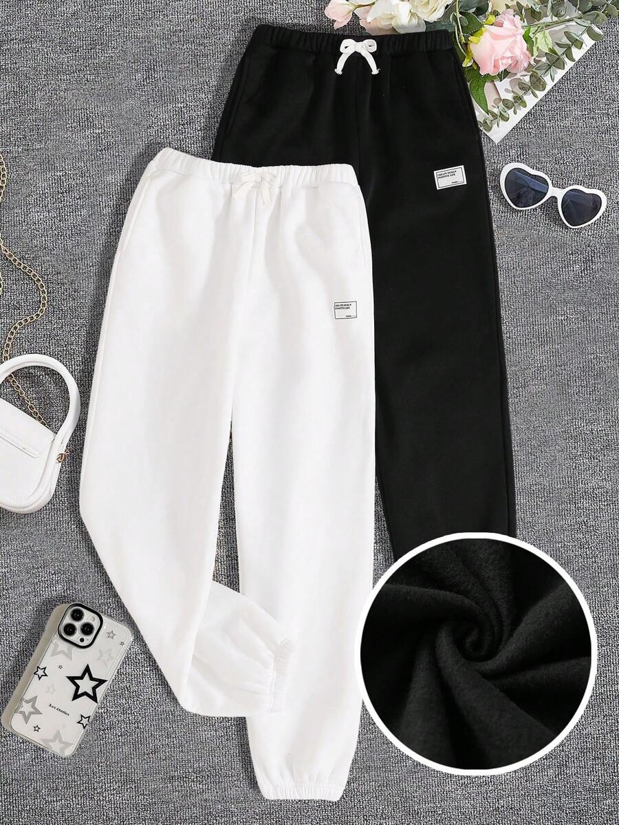 SHEIN Mua 1 tặng 1! Bộ 2 quần nỉ lót nơ thắt eo màu đen trắng cơ bản cho bé gái tuổi teen trở lại trường - Đen và trắng - Xem 1