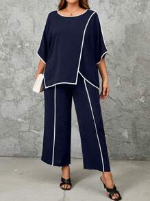 Bộ đồ hai mảnh áo xẻ tà gấu cánh dơi viền tương phản cỡ lớn và quần ống rộng - Màu xanh hải quân - Xem 1
