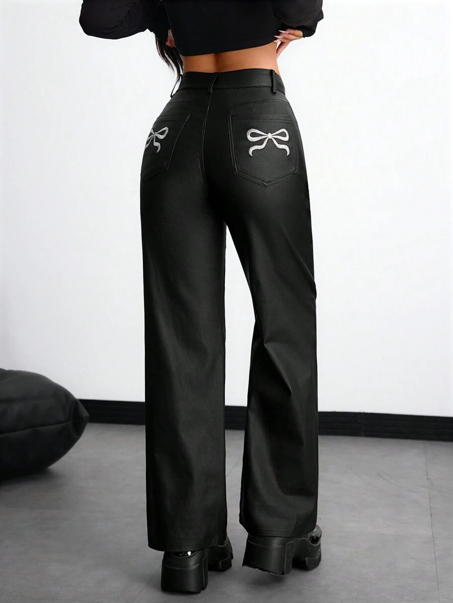 Damskie spodnie casualowe z szerokimi nogawkami i kieszeniami w motyle - Czarne - Zobacz 1