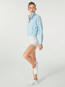 GLOWMODE Chaqueta reflectante para correr con cuello alto, mangas largas, bolsillos laterales, de tela elástica y absorbente de sudor para recorrer senderos - Celeste - Ver 8