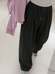 DAZY Quần nỉ dài tay dáng rộng co giãn màu trơn có túi rút, cạp chun cho nữ, màu đen, quần thể thao thường ngày cho mọi mùa, quần chạy bộ nữ, mùa đông - màu đen - Xem 3