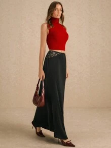 Poéselle Elegant Black Maxi Skirt With Lace Waist Detail: Sophisticated Long Skirt For Business And Casual Wear Featuring Asymmetric Cutout Lace Panels Versatile Office To Evening Attire Perfect For Formal Occasions Chic Professional Women's Fashion Statement Piece Graceful Daily Wear With Timeless Appeal Ideal For Business Casual And Formal Events - Black - View 1