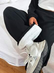Calça esportiva casual de cor sólida com perna reta, forro térmico para manter o calor