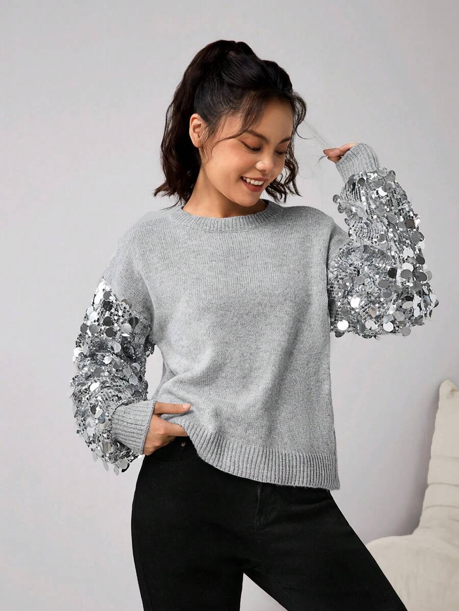 1 Áo len dệt kim đính sequin thời trang cho bé gái tuổi teen, thích hợp cho các bữa tiệc vào mùa thu/đông. Chất liệu vải màu xám bạc thời trang và đa năng, có thể kết hợp với váy để có vẻ ngoài hợp thời trang, hoàn hảo cho lễ Halloween, Giáng sinh và các bữa tiệc khác. - Bạc - Xem 1