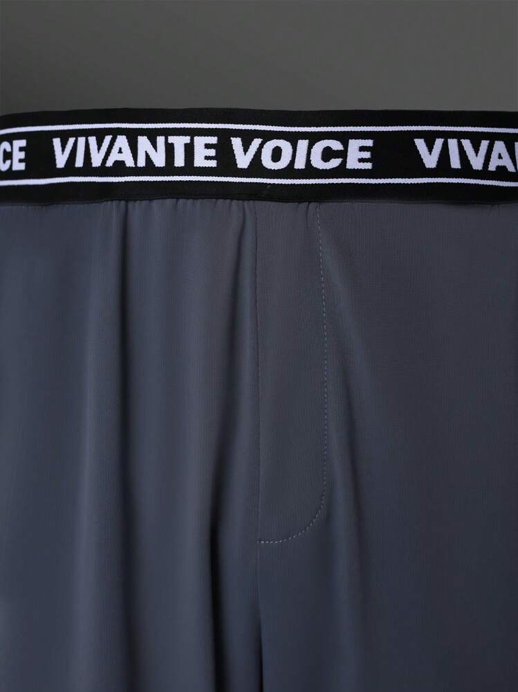 Manfinity Sport Corelite Pantalones deportivos tipo novio - Gris Oscuro - Añade 4