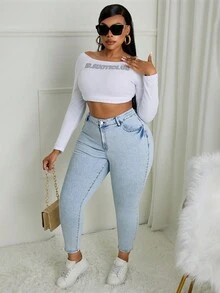 SHEIN SXY Jeans pitillo ajustados de talla grande en azul claro desgastados