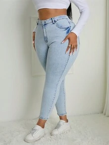SHEIN SXY Jeans pitillo ajustados de talla grande en azul claro desgastados