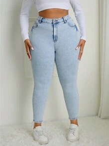 SHEIN SXY Jeans pitillo ajustados de talla grande en azul claro desgastados