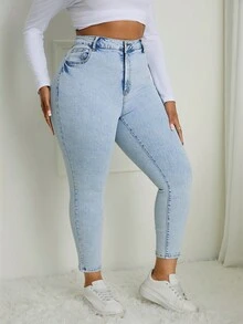 SHEIN SXY Jeans pitillo ajustados de talla grande en azul claro desgastados