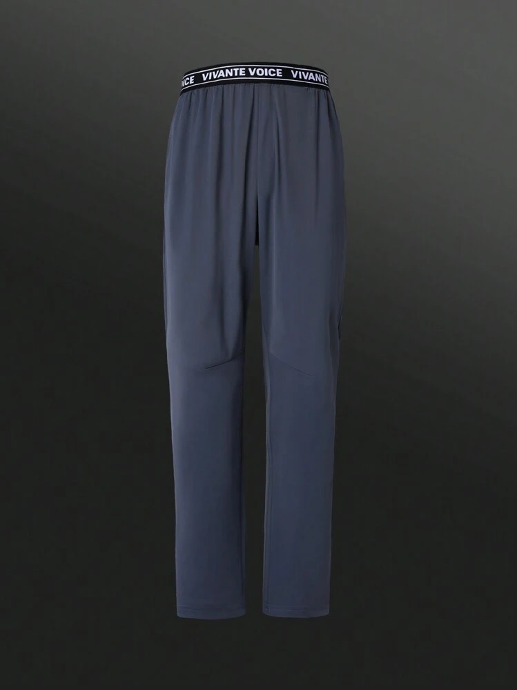 Manfinity Sport Corelite Pantalones deportivos tipo novio - Gris Oscuro - Añade 1