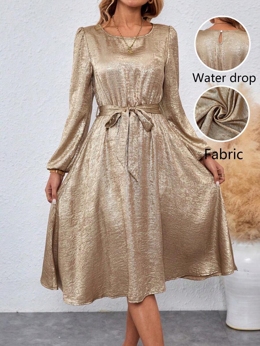 Chiquease Vestido largo de manga larga con escote redondo, cintura marcada y lazo para mujer con brillo metálico para fiestas y celebraciones de Año Nuevo - Dorado - Ver 1