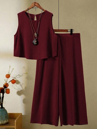 Set casual de 2 piezas de top de tirantes de cuello redondo y pantalones de pierna ancha en unicolor para mujeres de talla extra