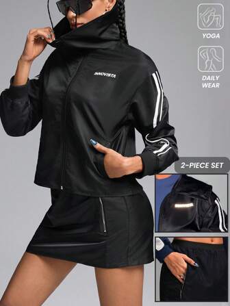 Innovista Sportanzug-Set mit halhem Rollkragen, kontrastierendem Jacket & Sport-Rock, 2-teilig, kurze Jacke, Reißverschlussjacke, Reißverschluss, Party, Colour-Block-Jacke, schwarz-weiße Jacke, Damenoutfit für den Herbst, Outdoor, Lässig mit Reißverschluss-Design am Rock