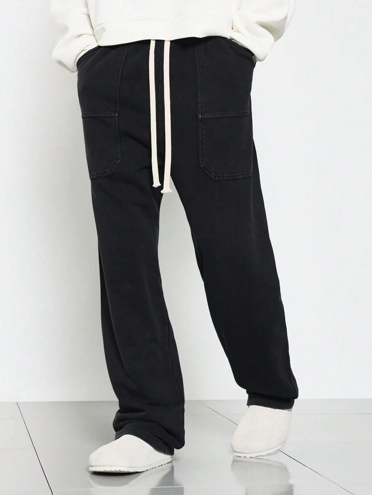 Calça jogger larga com cintura baixa e bolsos