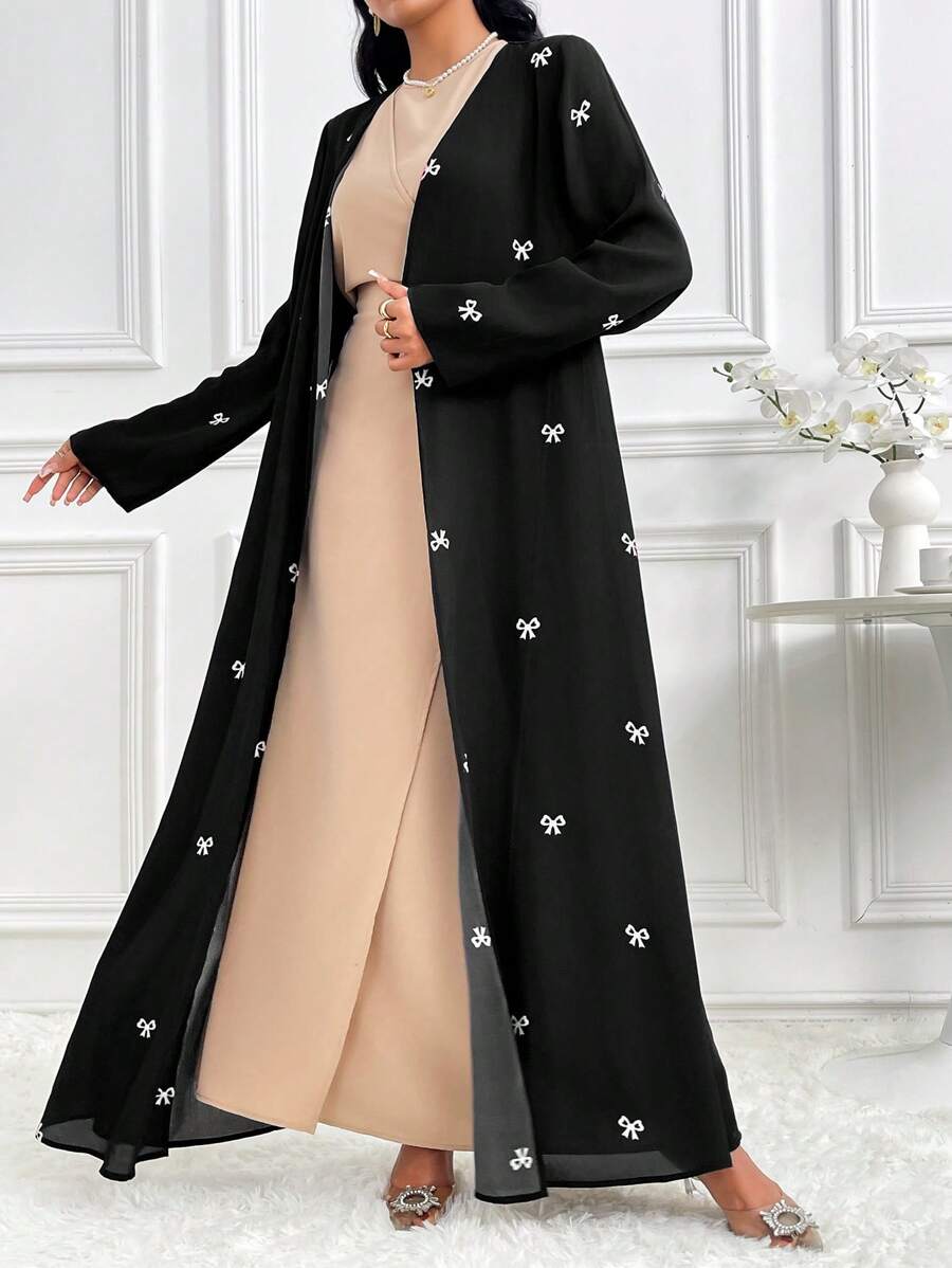 Al Najma Women's Elegant Long Sleeve Butterfly Print Modest Arabian Abaya Robe, For Travel/Holiday/Vacation/Parties - Black and White - View 1