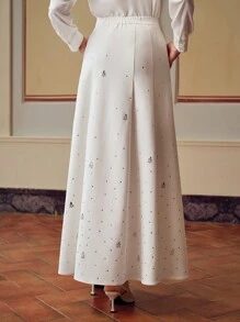 ZEYLAH RHINESTONE DETAIL SLANT POCKET FLARE SKIRT