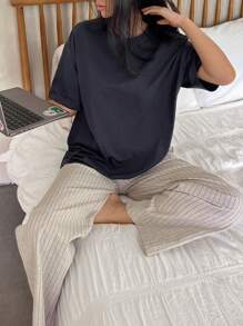 DAZY Conjunto de pijama de 2 piezas con camiseta de cuello redondo de hombros caídos y pantalones acanalados de unicolor para mujer