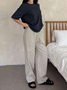 DAZY Conjunto de pijama de 2 piezas con camiseta de cuello redondo de hombros caídos y pantalones acanalados de unicolor para mujer