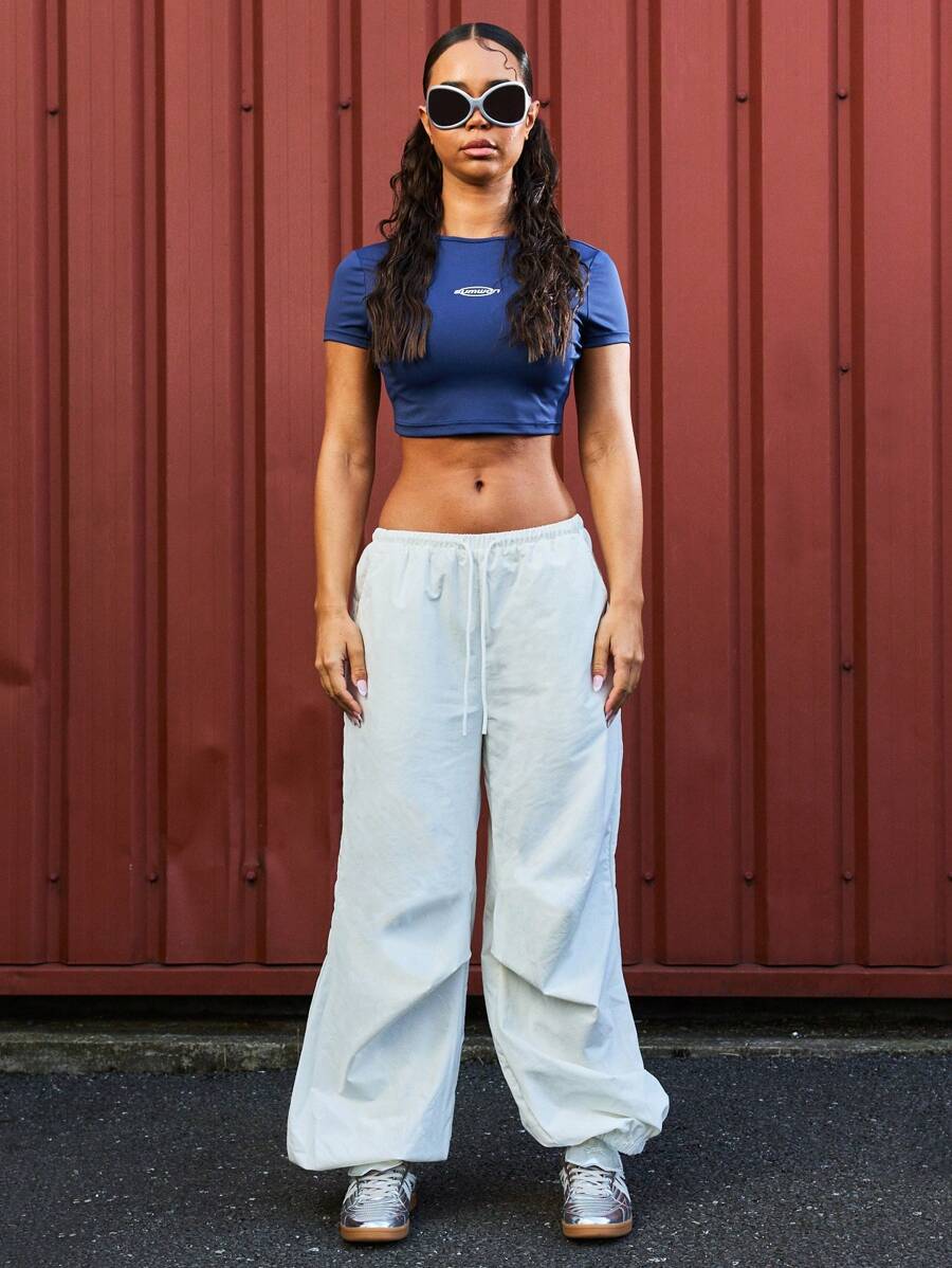 SUMWON WOMEN Low Rise Loose Baggy Fit Parachute Pants With Back Graphic Print - White - View 1