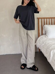 DAZY Conjunto de pijama de 2 piezas con camiseta de cuello redondo de hombros caídos y pantalones acanalados de unicolor para mujer