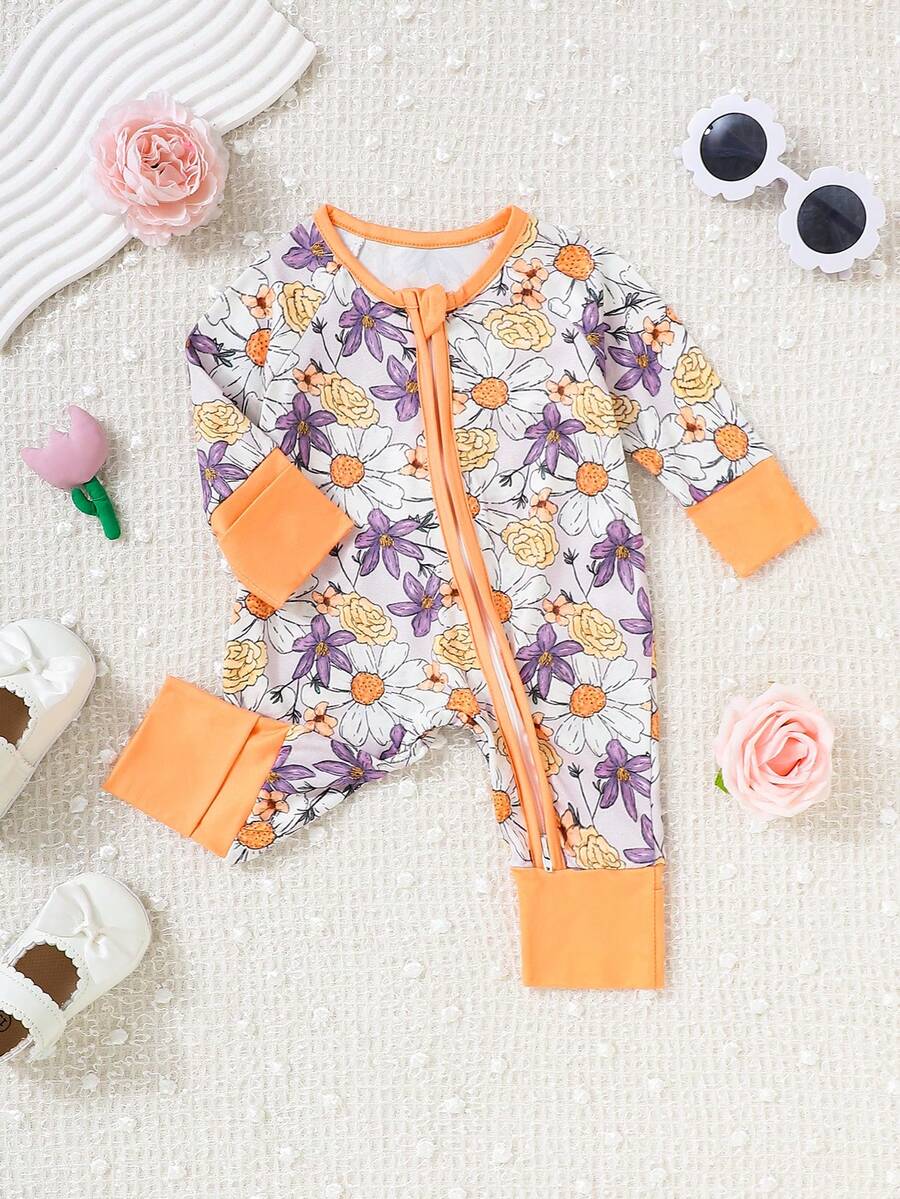 1 bộ đồ ngủ liền thân dài tay in họa tiết hoa cho bé gái, có khóa kéo phía trước. - Nhiều màu - Xem 1