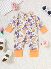 1 bộ đồ ngủ liền thân dài tay in họa tiết hoa cho bé gái, có khóa kéo phía trước. - Nhiều màu - Xem 2