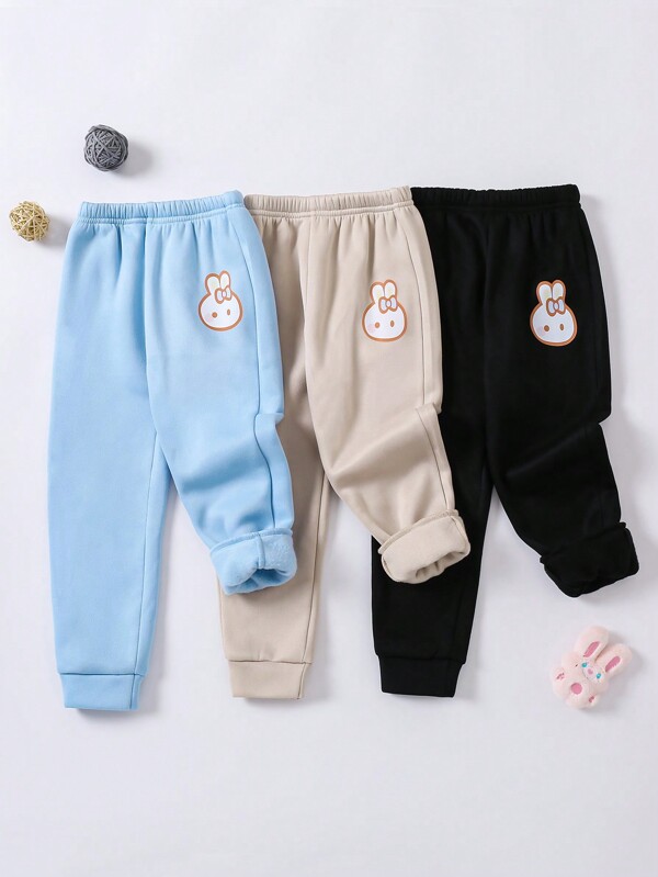 SHEIN Juego de 3 pantalones deportivos de cintura alta gruesos y con forro térmico con estampado de conejos lindos para niñas, para otoño/invierno