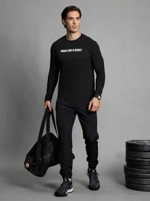 Manfinity Sport Corelite 男友风男士纯色抽绳腰斜口袋运动裤 - 黑色 - 查看 7