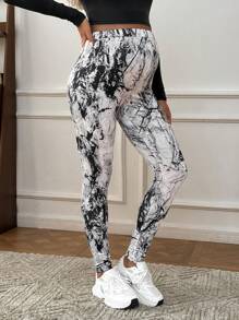 SHEIN Leggings de embarazo casuales con estampado todo sobre, ajustable en la cintura para el otoño