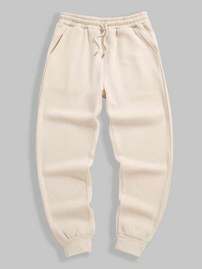 Manfinity Dauomo Pantalones casuales sencillos de unicolor con cordón y bolsillo para hombres